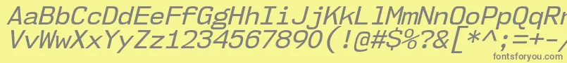 Nk57MonospaceNoRgIt Font – Gray Fonts on Yellow Background