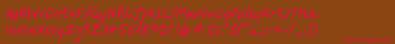 Wcmanonegrabta Font – Red Fonts on Brown Background