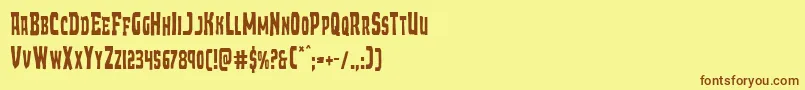 フォントDemonpriestcond – 茶色の文字が黄色の背景にあります。