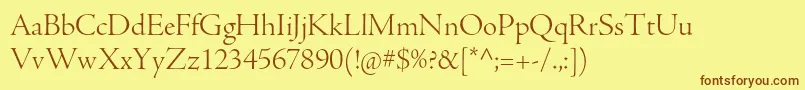 AjensonproLtdisp-fontti – ruskeat fontit keltaisella taustalla