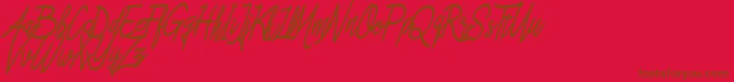 Asfrogas Font – Brown Fonts on Red Background