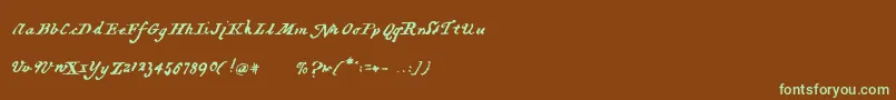 フォントHartzvier – 緑色の文字が茶色の背景にあります。