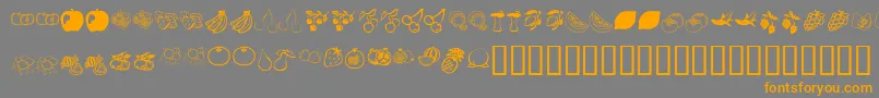 フォントKrFruitsy – オレンジの文字は灰色の背景にあります。