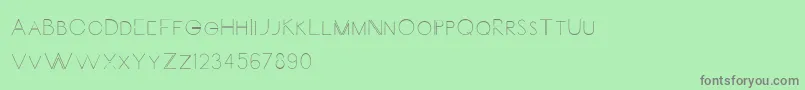 Carrinady Font – Gray Fonts on Green Background