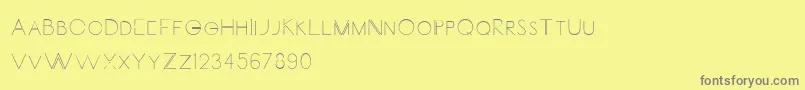 Carrinady Font – Gray Fonts on Yellow Background