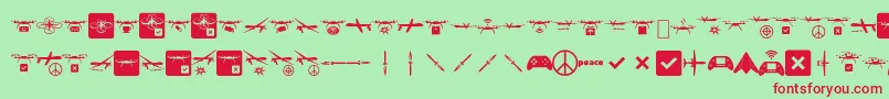 Droneattack-Schriftart – Rote Schriften auf grünem Hintergrund
