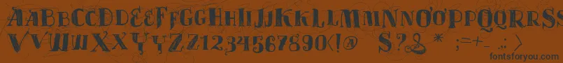 Vtks Velhos Tempos Font – Black Fonts on Brown Background