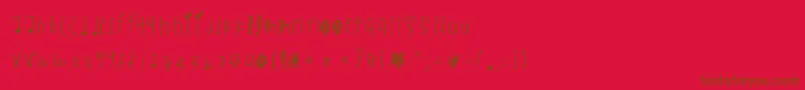 Więcej informacji o czcionce Blackmambadg Czcionka Blackmambadg – brązowe czcionki na czerwonym tle