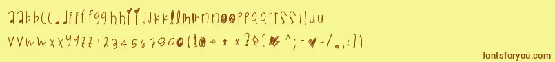 Blackmambadg Font – Brown Fonts on Yellow Background