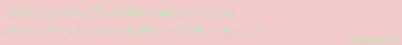 Blackmambadg-Schriftart – Grüne Schriften auf rosa Hintergrund