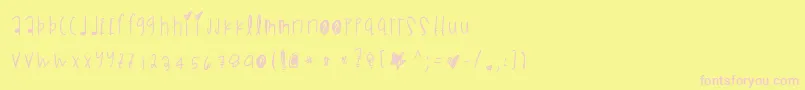 Czcionka Blackmambadg – różowe czcionki na żółtym tle