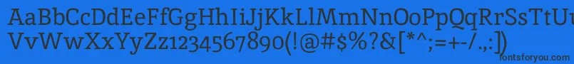 InikaRegular Font – Black Fonts on Blue Background