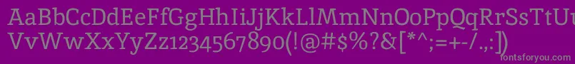 InikaRegular-fontti – harmaat kirjasimet violetilla taustalla
