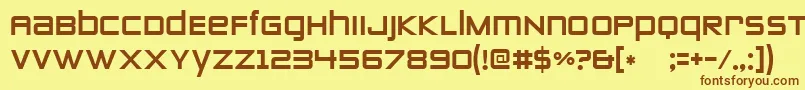 フォントZeroestwo – 茶色の文字が黄色の背景にあります。