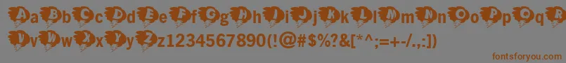 Kastorm Font – Brown Fonts on Gray Background