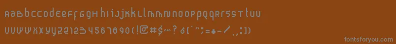 フォントProbolinggo – 茶色の背景に灰色の文字