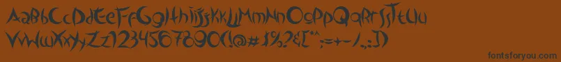 フォントOutsidersTypeface – 黒い文字が茶色の背景にあります