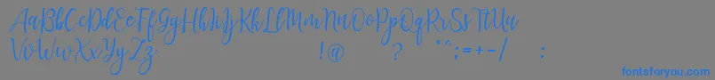 フォントLanaraScriptDemo – 灰色の背景に青い文字