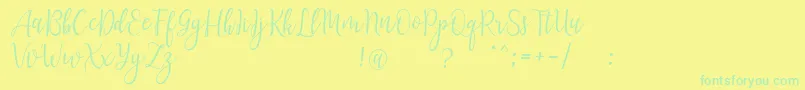 フォントLanaraScriptDemo – 黄色い背景に緑の文字