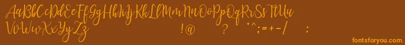 LanaraScriptDemo Font – Orange Fonts on Brown Background