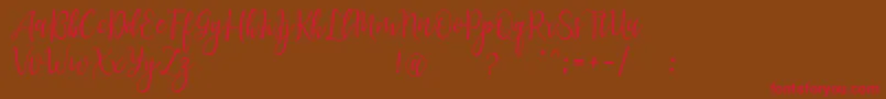 LanaraScriptDemo-Schriftart – Rote Schriften auf braunem Hintergrund