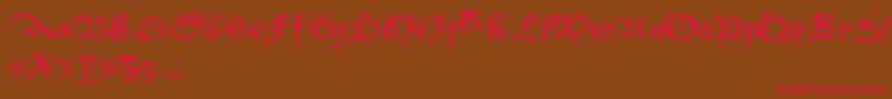 フォントDufay – 赤い文字が茶色の背景にあります。