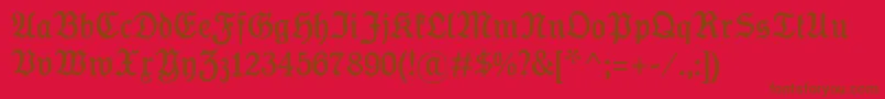 KoenigTypeMager-Schriftart – Braune Schriften auf rotem Hintergrund