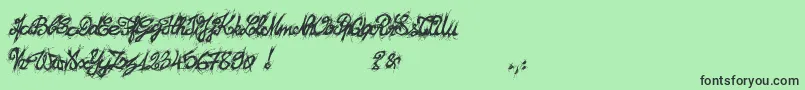 フォントEl26fontBrush2129 – 緑の背景に黒い文字