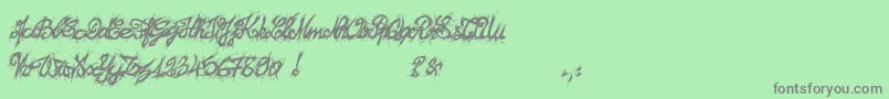 Fonte El26fontBrush2129 – fontes cinzas em um fundo verde