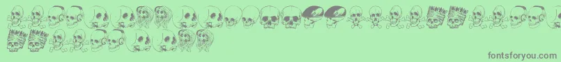 Fonte SkullFont – fontes cinzas em um fundo verde