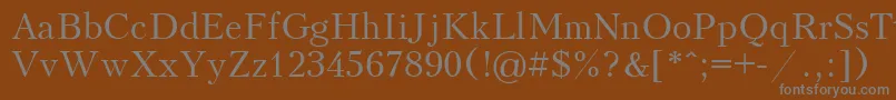 フォントKudriashov – 茶色の背景に灰色の文字