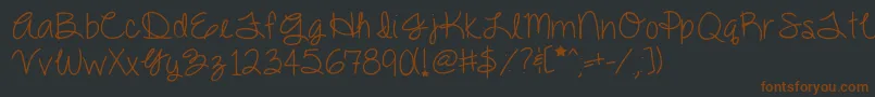 Dazzlingdivas-fontti – ruskeat fontit mustalla taustalla