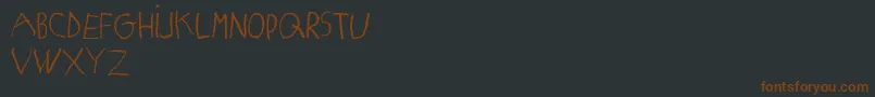 MatildasGradeSchoolHandDemoPrint Font – Brown Fonts on Black Background