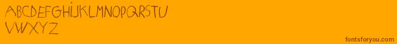 MatildasGradeSchoolHandDemoPrint Font – Brown Fonts on Orange Background