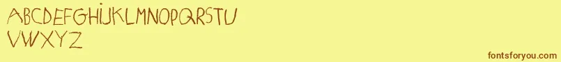 MatildasGradeSchoolHandDemoPrint Font – Brown Fonts on Yellow Background