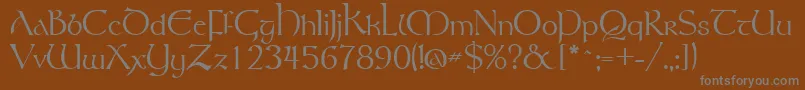 Gsttolrm Font – Gray Fonts on Brown Background