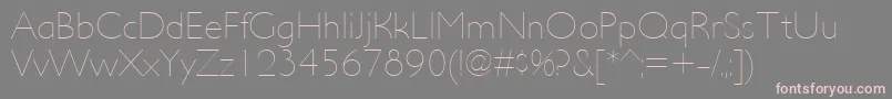 フォントUltimapdacUltralight – 灰色の背景にピンクのフォント