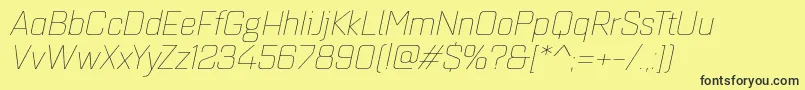 Quarcaextthinitalic Font – Black Fonts on Yellow Background