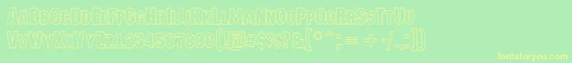 AMachinanovacpsotl Font – Yellow Fonts on Green Background