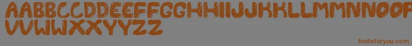 Weitere Informationen zur FontesdaTfb-Schriftart FontesdaTfb-Schriftart – Braune Schriften auf grauem Hintergrund