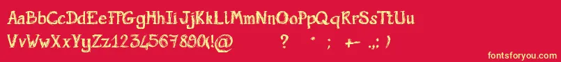 フォントScriptGribouillon – 黄色の文字、赤い背景