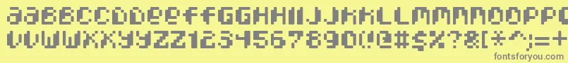 フォントPixcelPhat – 黄色の背景に灰色の文字