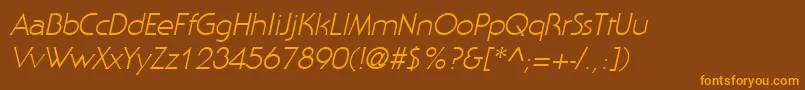 フォントStaidItalic – オレンジ色の文字が茶色の背景にあります。