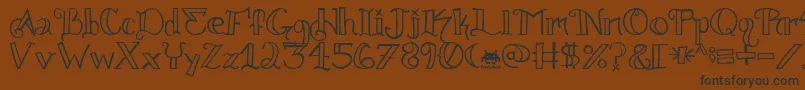 Knuckle.Tatz.Fontvir.Us Font – Black Fonts on Brown Background