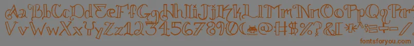 Knuckle.Tatz.Fontvir.Us-Schriftart – Braune Schriften auf grauem Hintergrund