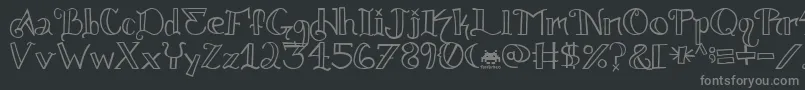 フォントKnuckle.Tatz.Fontvir.Us – 黒い背景に灰色の文字