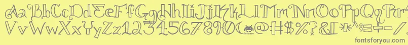 Шрифт Knuckle.Tatz.Fontvir.Us – серые шрифты на жёлтом фоне