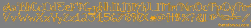 フォントKnuckle.Tatz.Fontvir.Us – オレンジの文字は灰色の背景にあります。