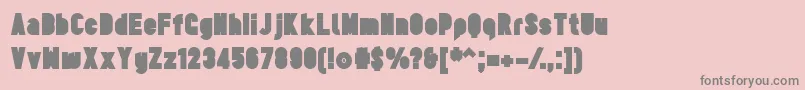 フォントTesUltrablack – ピンクの背景に灰色の文字