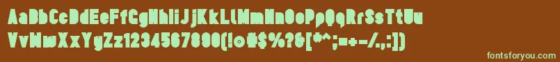 TesUltrablack-fontti – vihreät fontit ruskealla taustalla